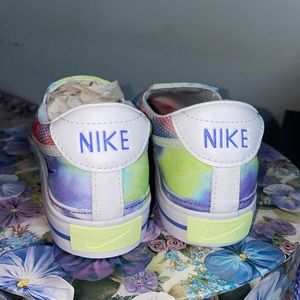 Women’s tie dye Nikes slip-ons